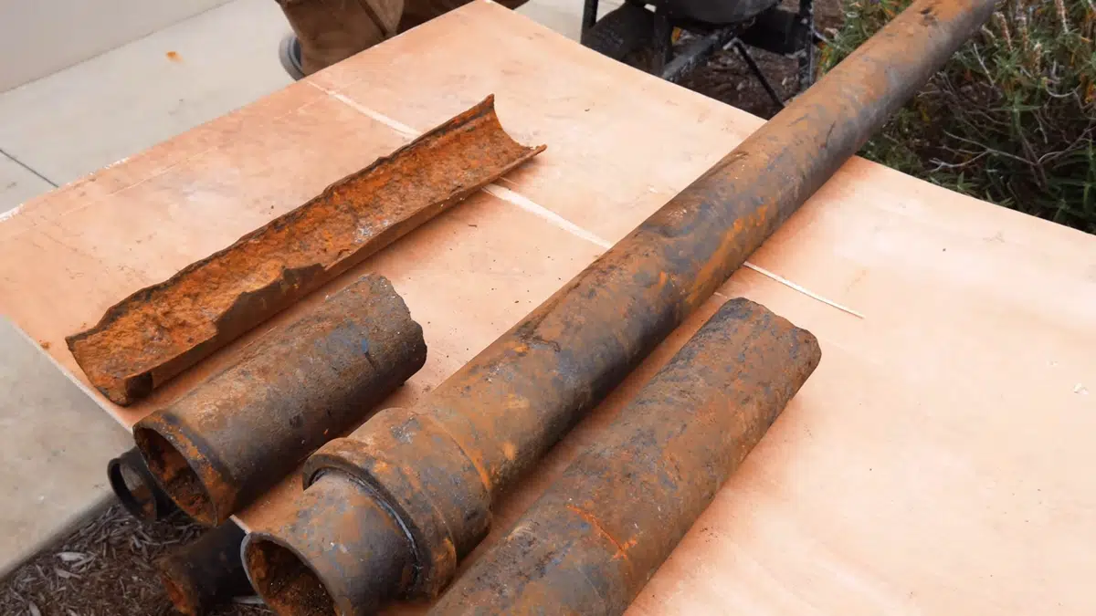 Corroded cast iron drain pipe showing rust and interior wear for Plumbing in Mayfair, Bellflower CA in Mayfair Bellflower