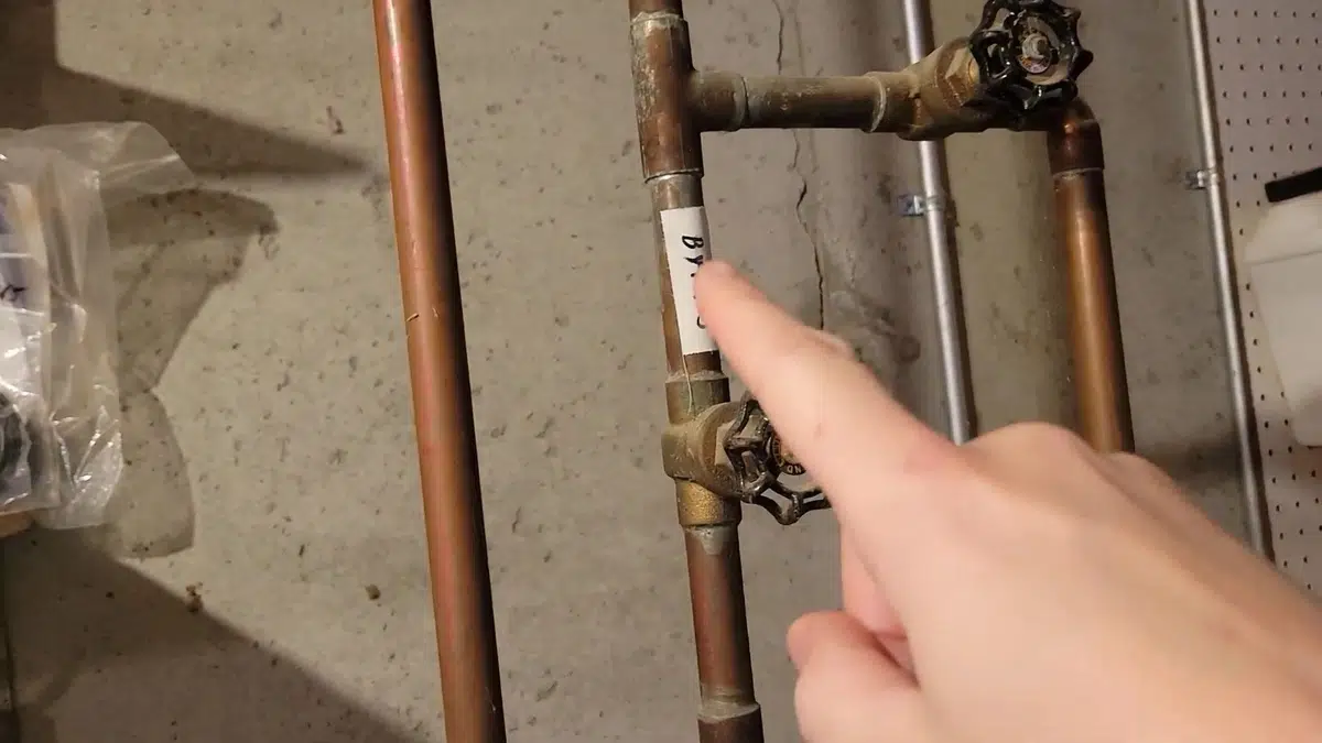 Gas water heater connections being installed and checked for Water Heater Replacement Cost in Bellflower: Tank, Tankless, and What the Permit Adds