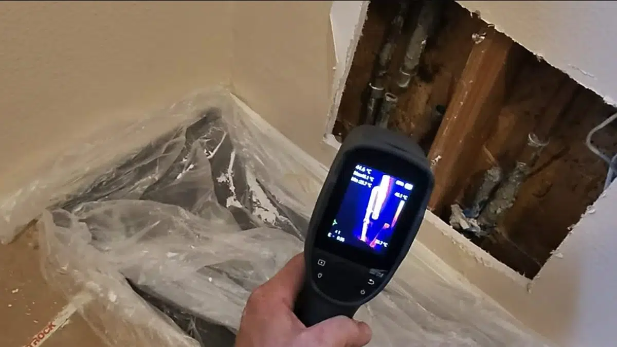 Leak detection equipment checking a wall, slab, or pipe opening for Slab Leak Repair Options Explained: Spot Repair, Reroute, or Epoxy Lining