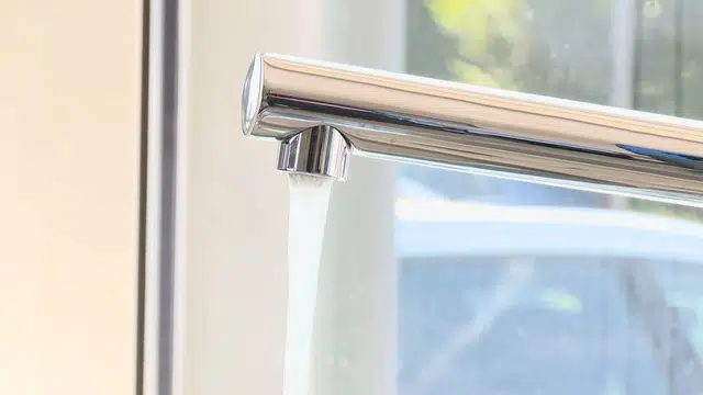 Sink faucet and shutoff valve connection being serviced for Plumbing Tips and Guides