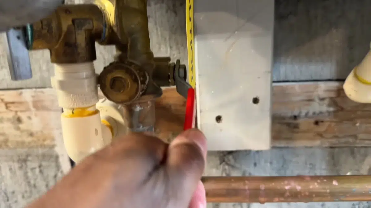 Tankless water heater with service ports and gas connections for Tankless Water Heater Services in Bellflower, CA detail view