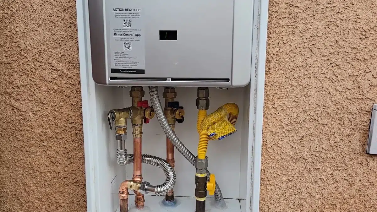 Tankless water heater with service ports and gas connections for Tankless Water Heater Services in Bellflower, CA