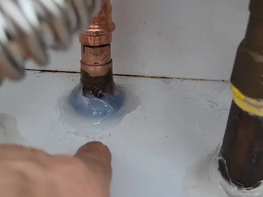 Tankless water heater with service ports and gas connections for Plumbing Service Areas in Index.Html