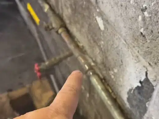 Underground water service line exposed near soil and landscaping for Plumbing Service Areas in Index.Html alternate angle