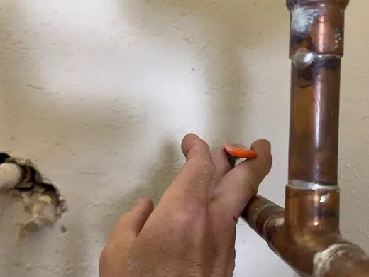 Water heater component showing corrosion, anode wear, or inlet repair for Plumbing Services in Bellflower, CA