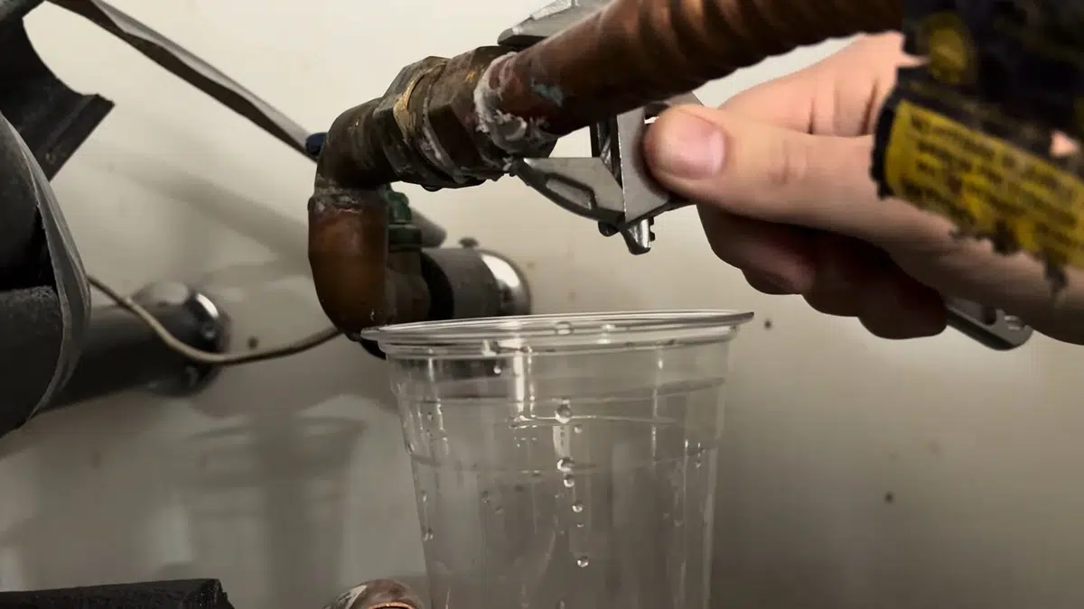 Water heater component showing corrosion, anode wear, or inlet repair for Plumbing Services in Cerritos, CA